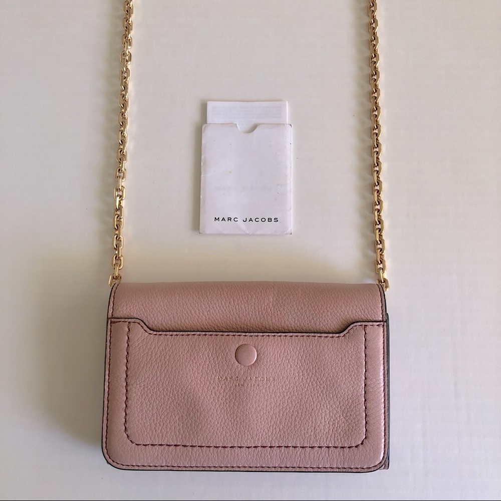 Marc Jacobs mini leather crossbody with gold chain strap.